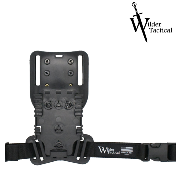 Wilder Tactical ein modifiziertes UBL-Panel mit einem Stecker, einem beweglichen SCHWARZEN Riemen und einem QLS 19-Stecker.